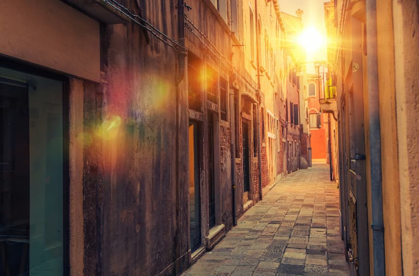 Sunset in historic city district often visited by tourists